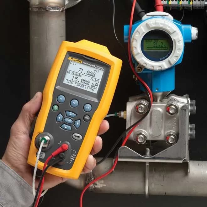 Technician wiring electrical distribution board