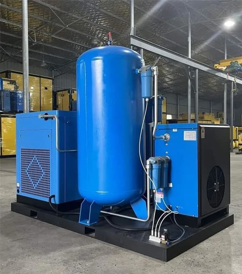 Large industrial skid-mounted blue air compressor system assembly in factory warehouse
